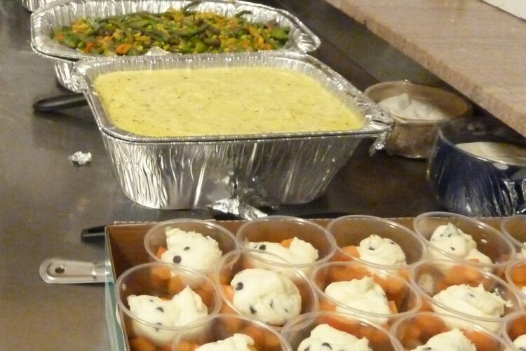 Volunteer Cooks Serve Dinner and Community Care